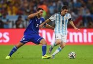 RIO DE JANEIRO, BRAZIL - JUNE 15:  Lionel Messi of Argentina fights off Sead Kolasinac of Bosnia and Herzegovina during the 2014 FIFA World Cup Brazil Group F match between Argentina and Bosnia-Herzegovina at Maracana on June 15, 2014 in Rio de Janeiro, Brazil.  (Photo by Matthias Hangst/Getty Images)